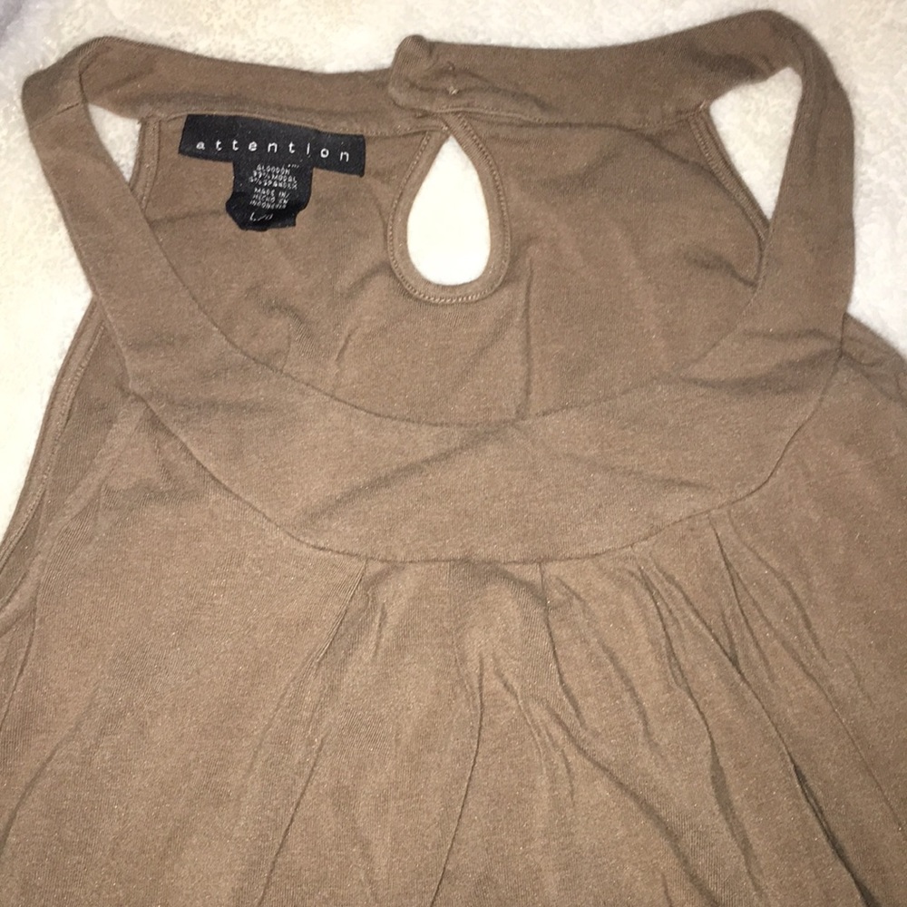 Cute brown shirt with ruffles at chest area